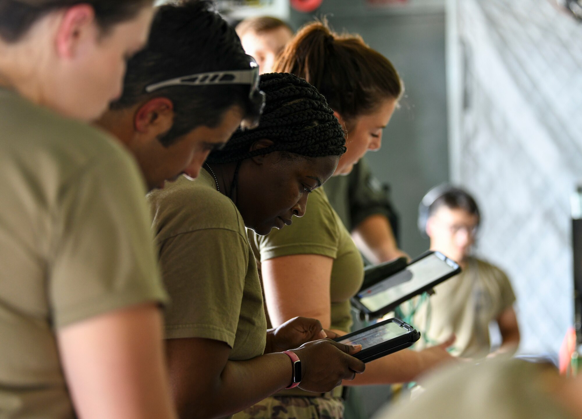 Maj. Julia Joseph, a flight nurse assigned to the 183rd Aeromedical Evacuation Squadron, takes crew and patient accountability before boarding a C-17 Globemaster III at MacDill Air Force Base, June 25. The Airmen completed their annual training, where they honed their skills in patient care. (U.S. Air National Guard photo by 1st Lt. Kiara N. Spann)