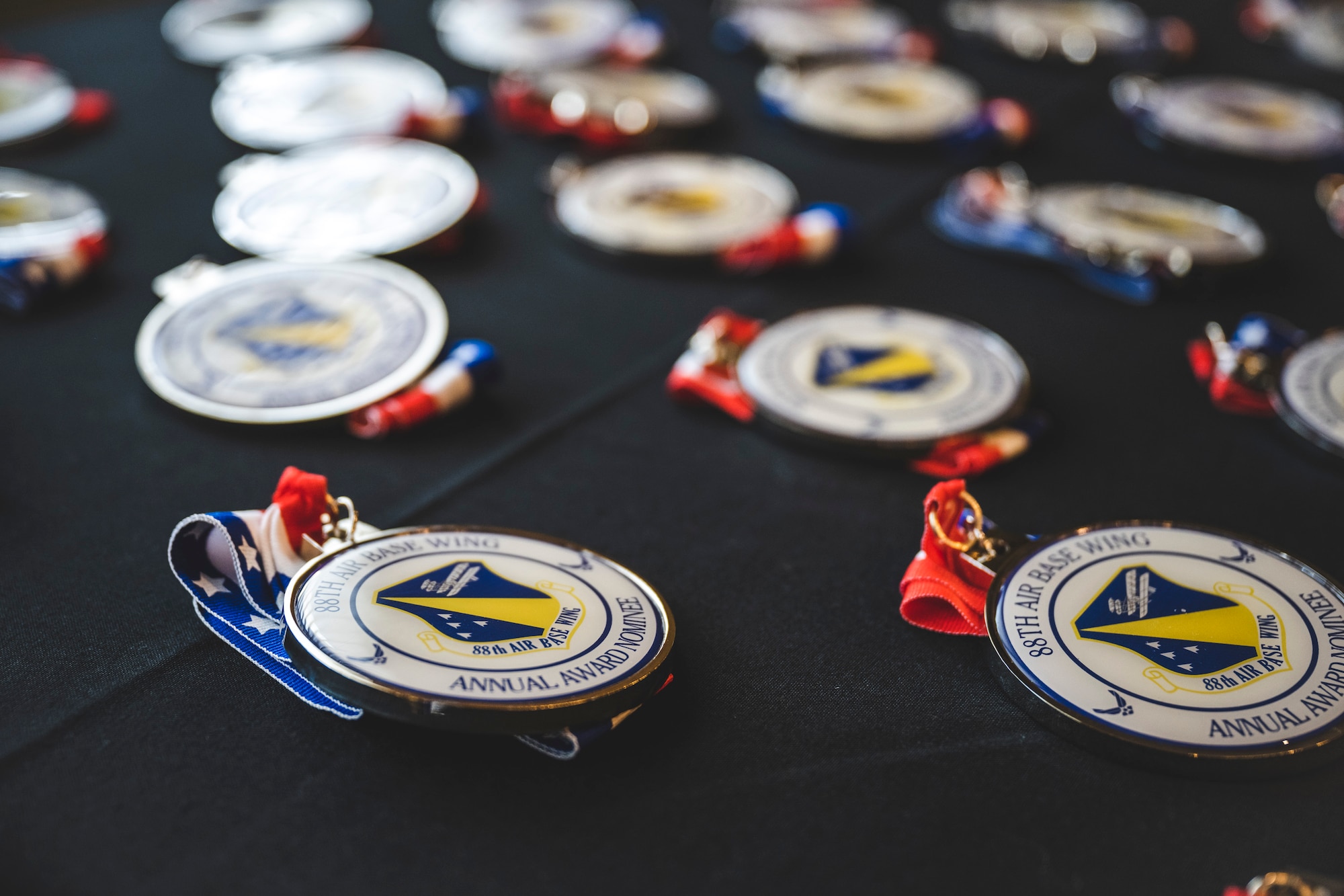 Nominee medallions are laid out in preparation for the 88th Air Base Wing’s annual awards ceremony Jan. 27 at the Wright-Patt Club on Wright-Patterson Air Force Base, Ohio.