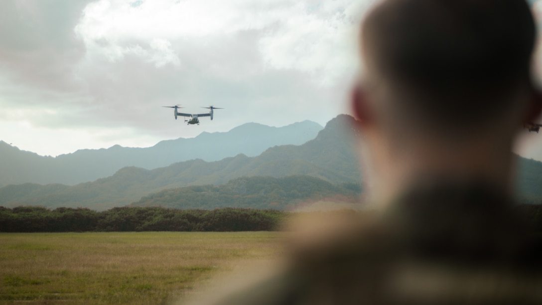 U.S. Marines with Marine Medium Tiltrotor Squadron 363 prepare to land an MV-22 Osprey during a 1st Battalion, 12th Marines, 3d Marine Division training event at Marine Corps Training Area Bellows, Hawaii, Jan. 18, 2023.