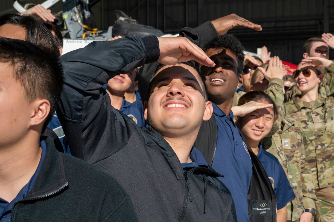 Air Force ROTC Detachment 060 from the University of Southern California watches flying aircraft during a recent visit to Edwards Air Force Base, California, Jan. 27. The cadets spent the day learning about the various career fields available to them upon graduation and entering into service.