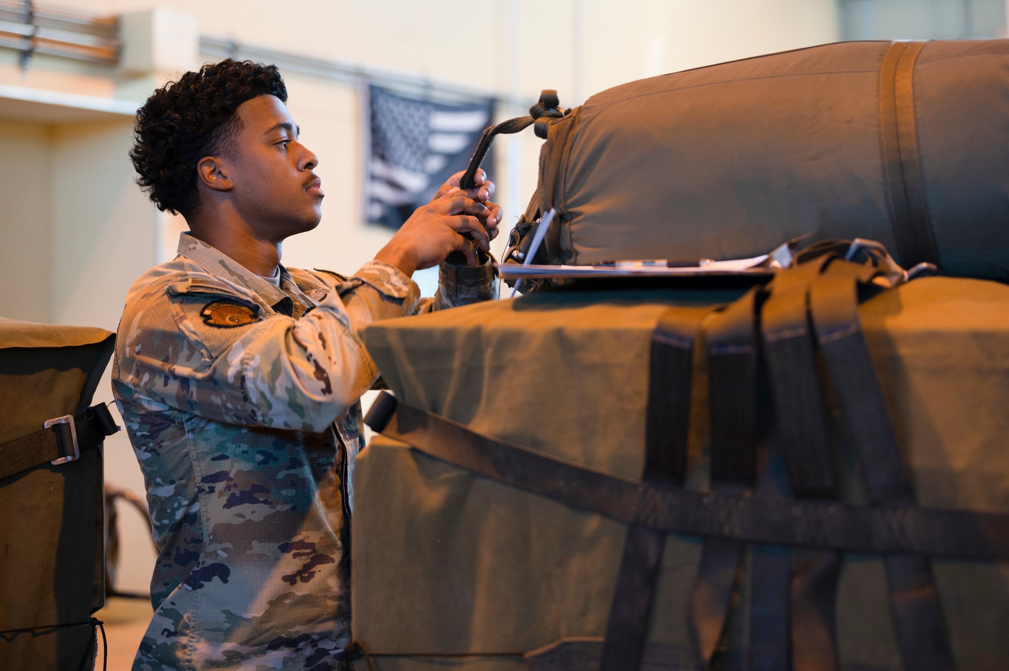 A U.S. Air Force Airman inspects cargo