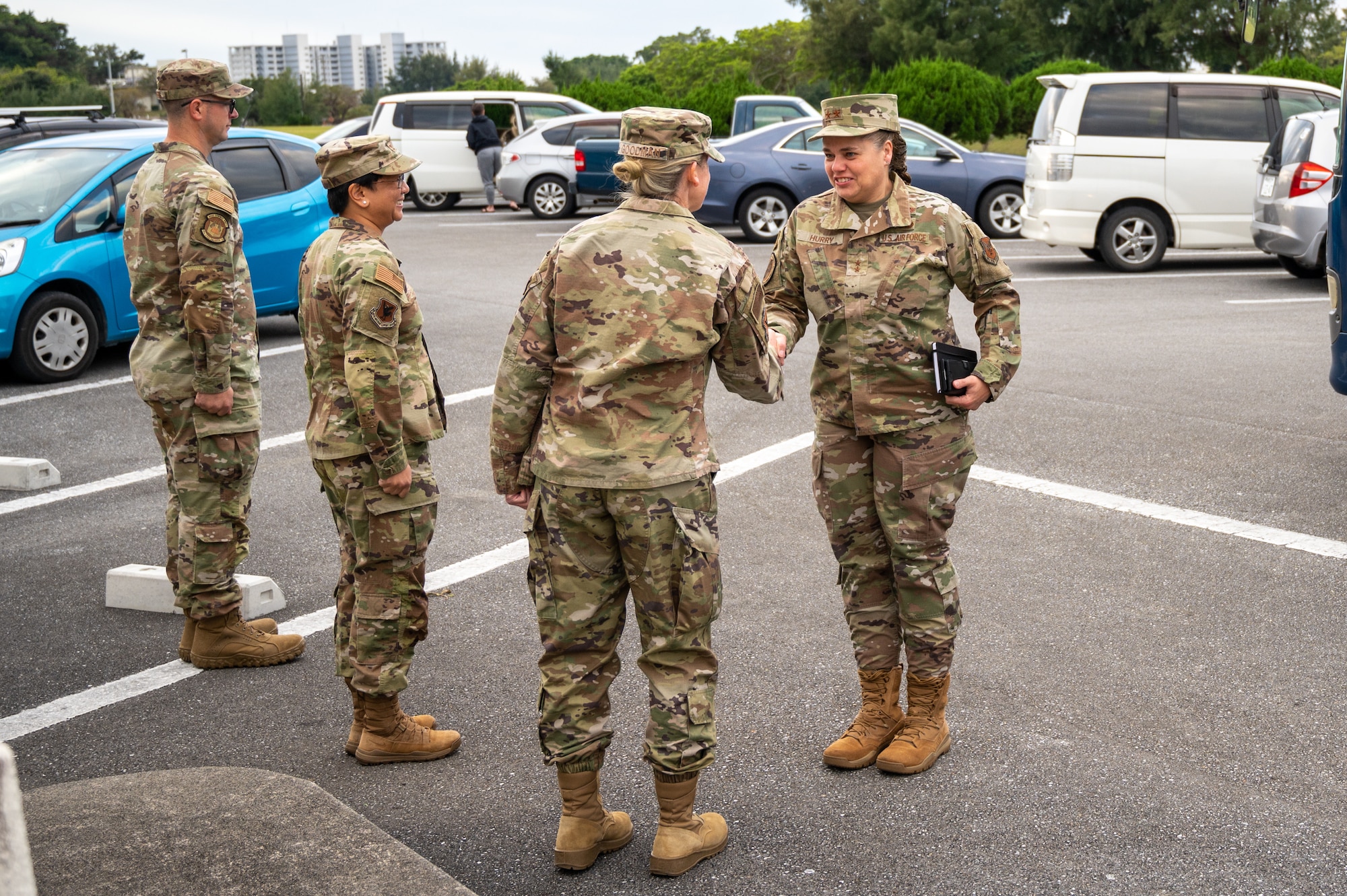 Airmen greet each other