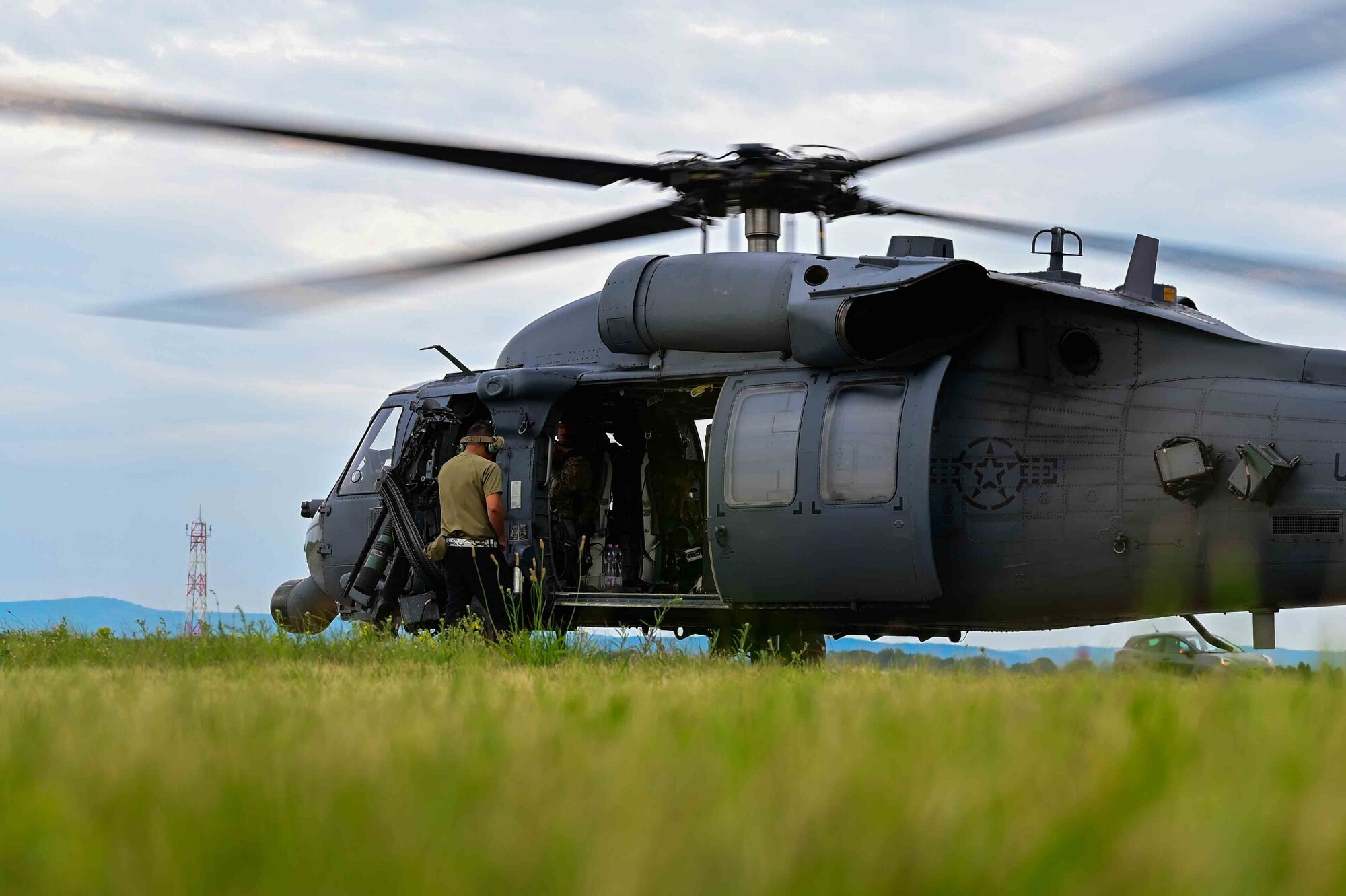 U.S. Air Force Staff Sgt. Christopher Ozaki, 56th Rescue Generation Squadron crew chief, conducts pre-flight checks.