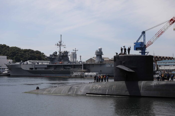 The Ohio-class guided-missile submarine USS Michigan (SSGN 727) arrives in Fleet Activities Yokosuka, July 2, 2023. Homeported in Naval Base Kitsap, Bangor, Washington, Michigan provides strike and special operation mission capabilities from a stealthy, clandestine platform.