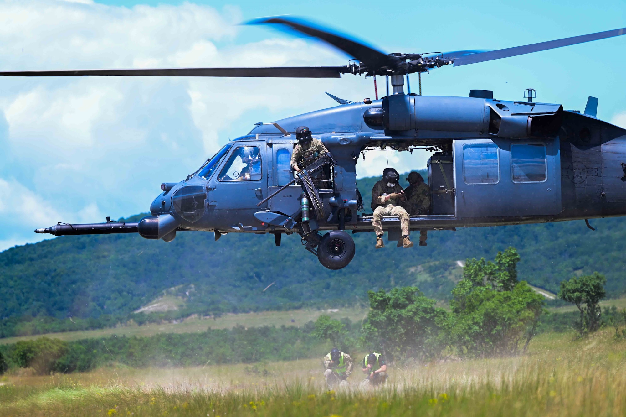 A U.S. Air Force HH-60G Pave Hawk assigned to the 56th Rescue Generation Squadron from Aviano Air Base lands to pick up survivors during exercise Jolly Vihar