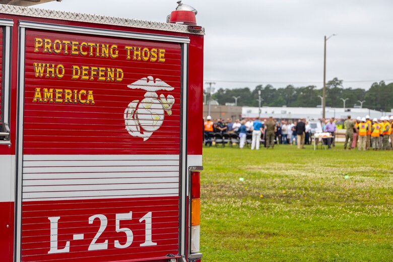 Representatives from the Office in Charge of Construction (OICC) Florence, Whiting-Turner Contracting Company attend the groundbreaking ceremony for Military Construction Project 142, the construction of a replacement fire station and satellite station, at Marine Corps Air Station Cherry Point, May 31, 2023.