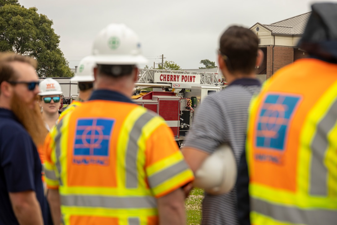 Representatives from the Office in Charge of Construction (OICC) Florence, Whiting-Turner Contracting Company attend the groundbreaking ceremony for Military Construction Project 142, the construction of a replacement fire station and satellite station, at Marine Corps Air Station Cherry Point, May 31, 2023.