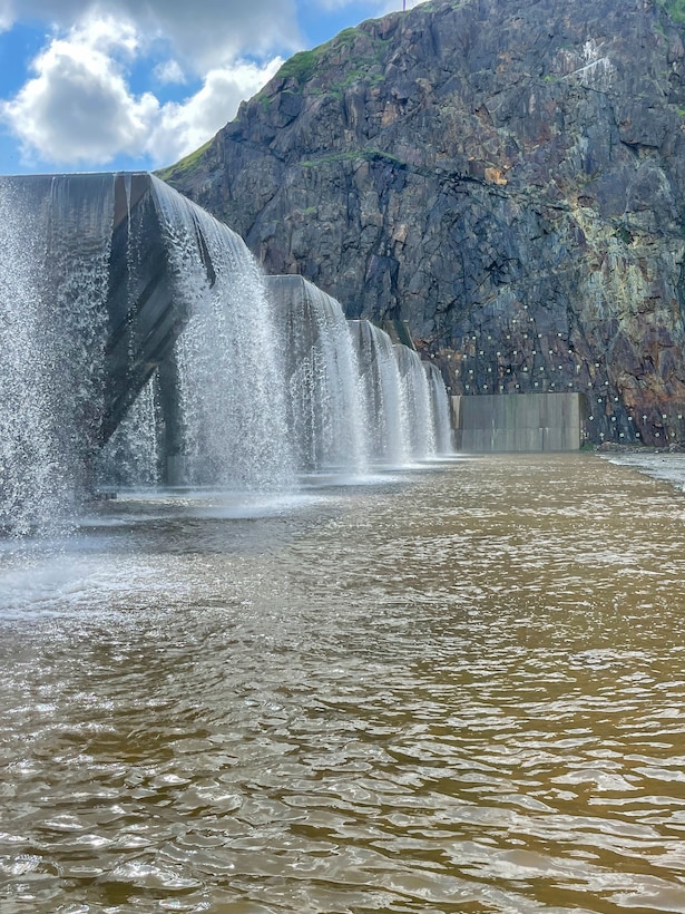 Water Flows Over Fuse Gates of Terminus Dam