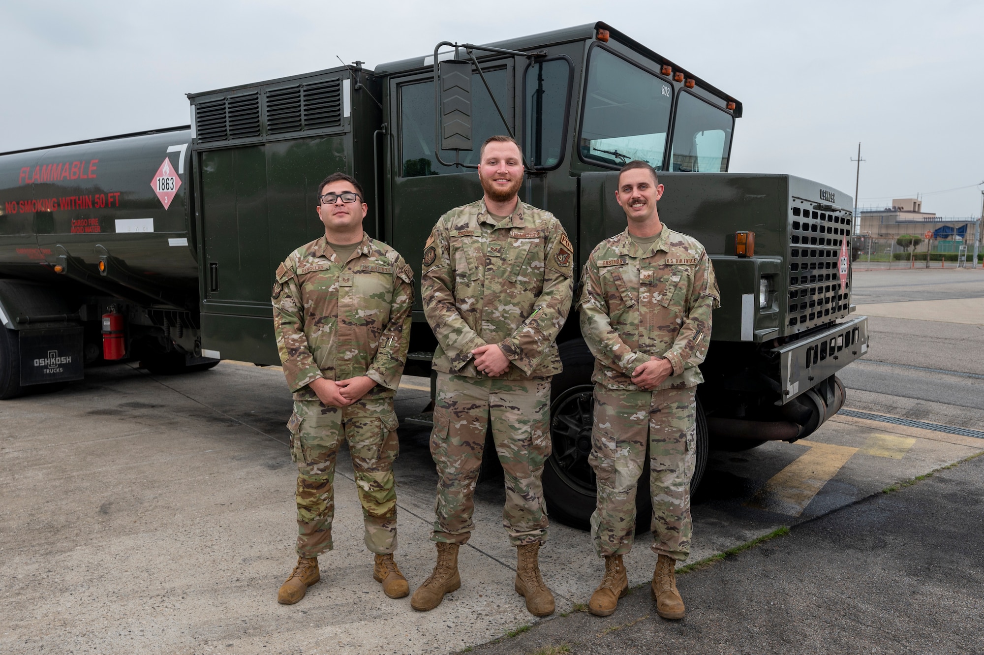From left to right, U.S. Air Force Staff Sgt. Angel Rebollar, 51st Logistics Readiness Squadron (LRS) fuels laboratory non-commissioned officer in charge (NCOIC); Staff Sgt. Lucas Amodeo, 51st LRS fuels mobile distribution supervisor, and Tech. Sgt. Mark Eastman, 51st LRS fuels distribution NCOIC, pose for a photo at Osan Air Base, Republic of Korea, June 29, 2023. These three Airmen helped prepare, sustain and recover Andersen Air Force Base, Guam, from Typhoon Mawar May 22 to June 5, 2023. The team assisted Andersen AFB’s 36th LRS in securing 60 million gallons of fuel and 30 refueling assets, protecting $245 million supplies from the storm. (U.S. Air Force photo by Senior Airman Aaron Edwards)