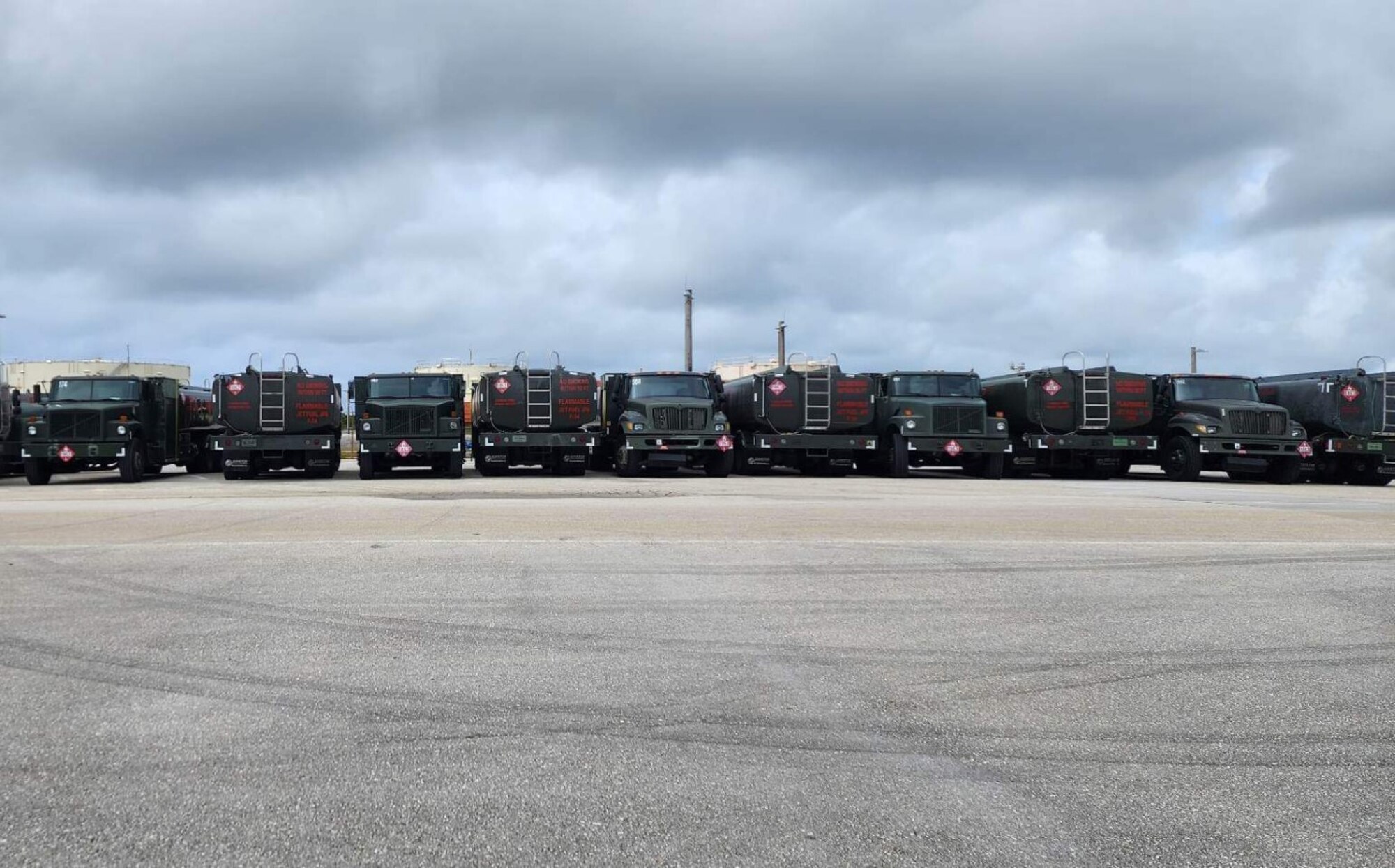 Several 36th Logistics Readiness Squadron fuel trucks are configured in a ‘storm formation’ at Andersen Air Force Base, Guam. The trucks were relocated and strapped down in preparation for Typhoon Mawar, which hit Guam May 24, 2023. (Courtesy photo)