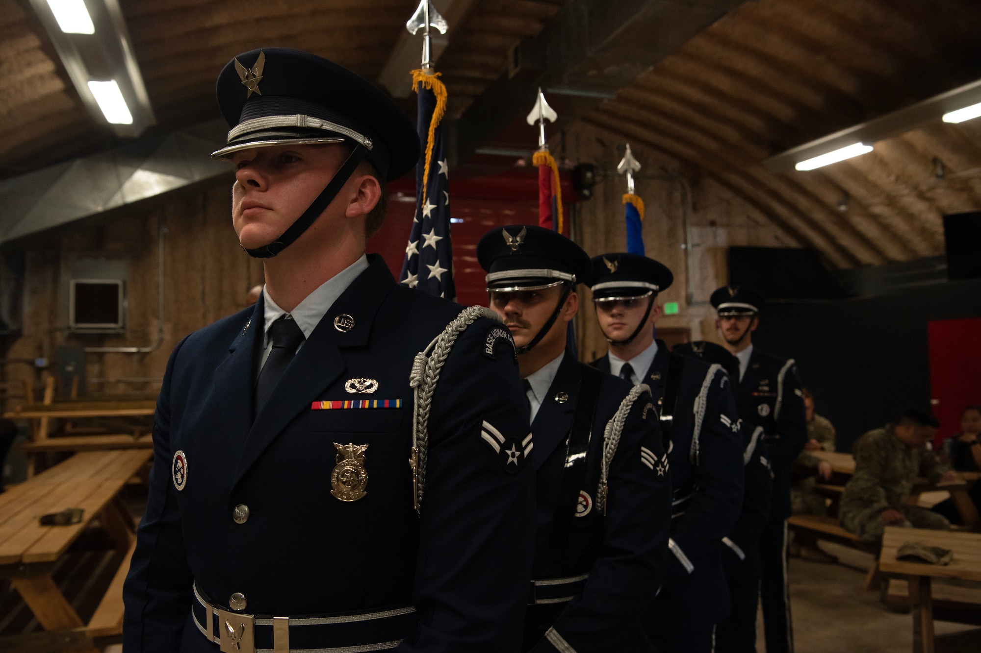 Members of the 36th Wing Honor Guard stand in position.
