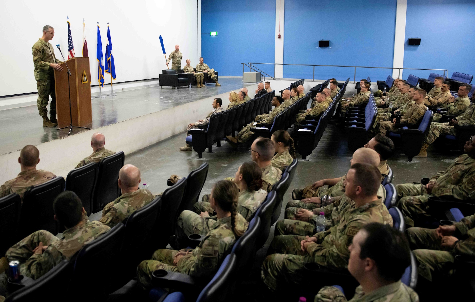 U.S. Air Force Lt. Gen. Alexus Grynkewich, 9th Air Force (Air Forces Central) commander, and Combined Forces Air Component Commander for U.S. Central Command, left, speaks during the 1st Expeditionary Theater Support Group activation and change of command ceremony July 3, 2023, at Al Udeid Air Base, Qatar. Since its inception in March, the ETSG has successfully conducted missions across 12 different bases in eight countries. The group consists of multi-capable Airmen with expertise from engineering, logistics and communications to conduct more effective warfighting missions. (U.S. Air Force photo by Staff Sgt. Jennifer Zima)