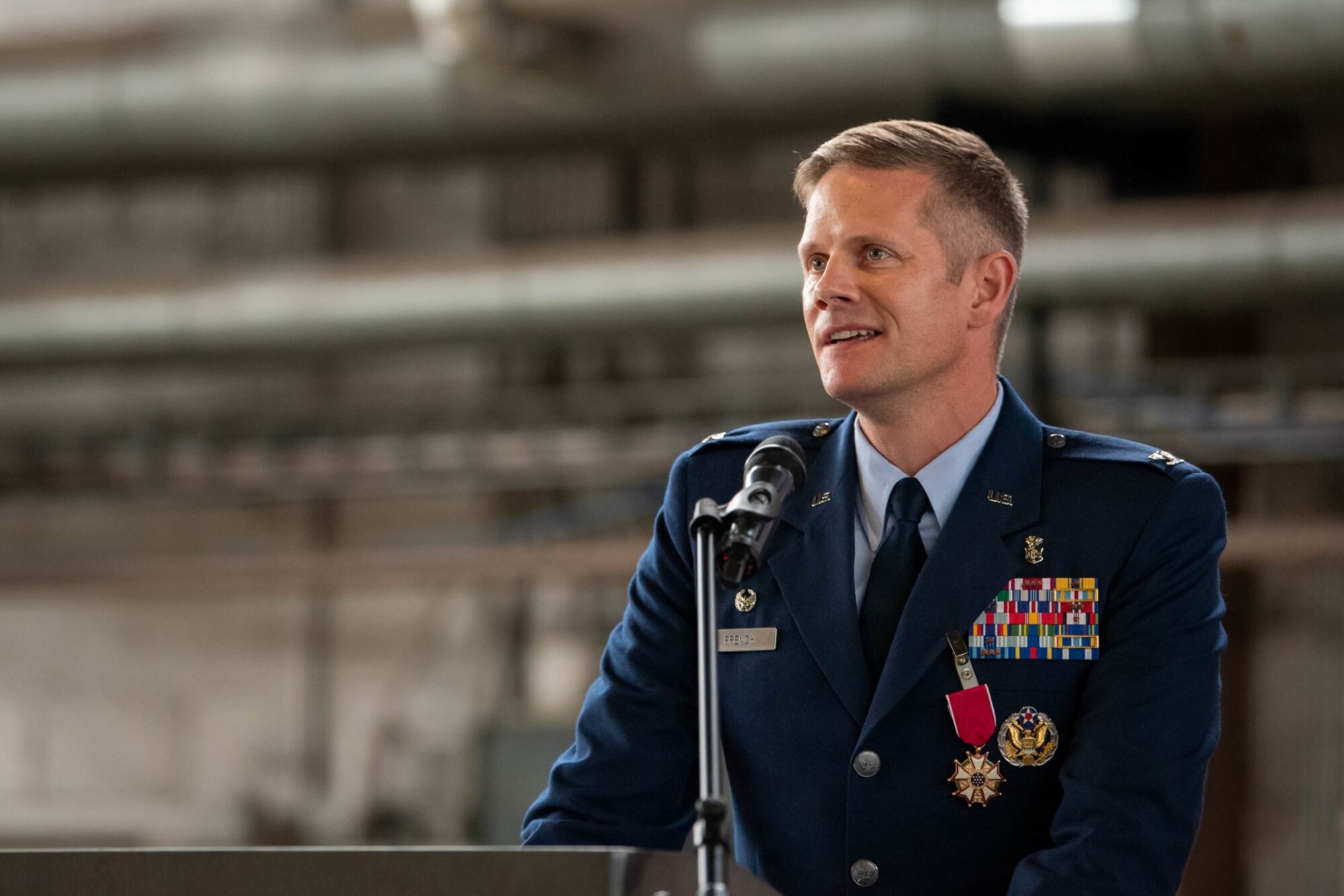 U.S. Air Force Col. Peter French, outgoing 52nd Medical Group commander, makes his final remarks during the 52nd MDG change of command ceremony June 30, 2023, on Spangdahlem Air Base, Germany.