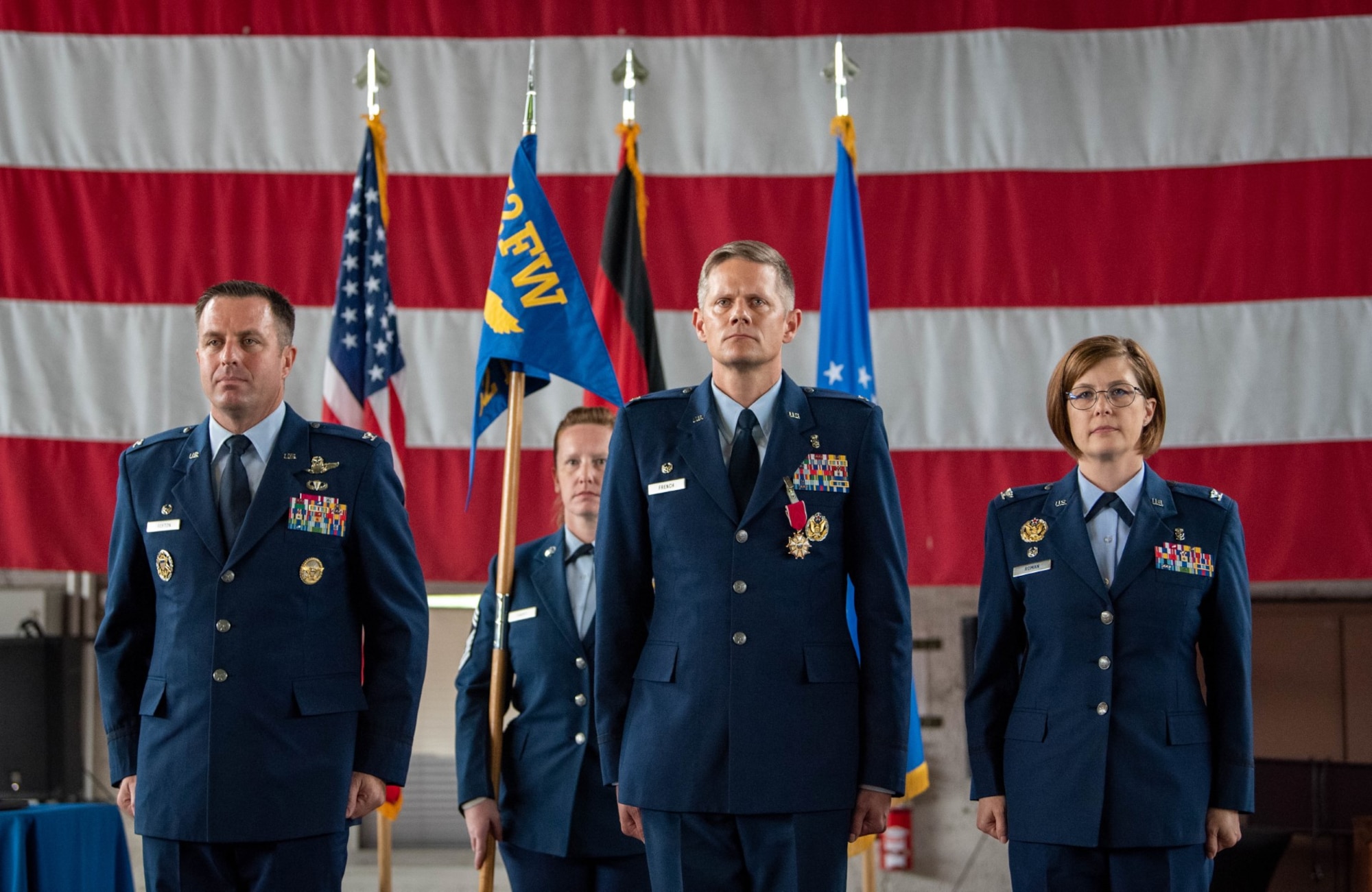 52nd Fighter Wing leadership stand at attention during a 52nd Medical group change of command ceremony June 30, 2023, on Spangdahlem Air Base, Germany.