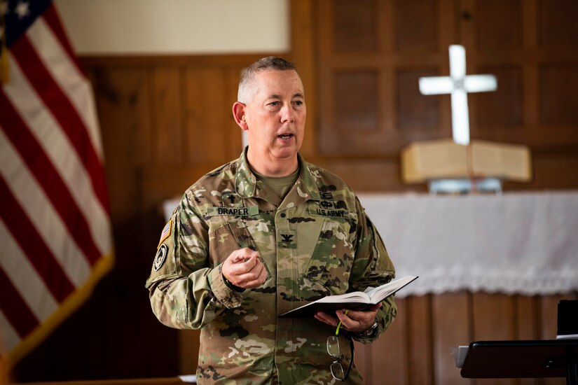 Col. William Draper, chaplin, Kentucky Army National Guard,  delivers a sermon for attendees of the Cyber Shield Training exercise at the Camp Robinson chapel, Little Rock Ark., June 2-16, 2023. More than 800 National Guard Soldiers, Airmen, and civilian cyber professionals from around the world gather during this year’s Cyber Shield Training exercise. More than 25 states and territories will participate in the event and will make a signifiacnt milestone as members from five State Partnership Programs join forces with the National Guard cyber teams for the first time during the event. (Kentucky National Guard photo by Staff Sgt. Jeffery Reno)