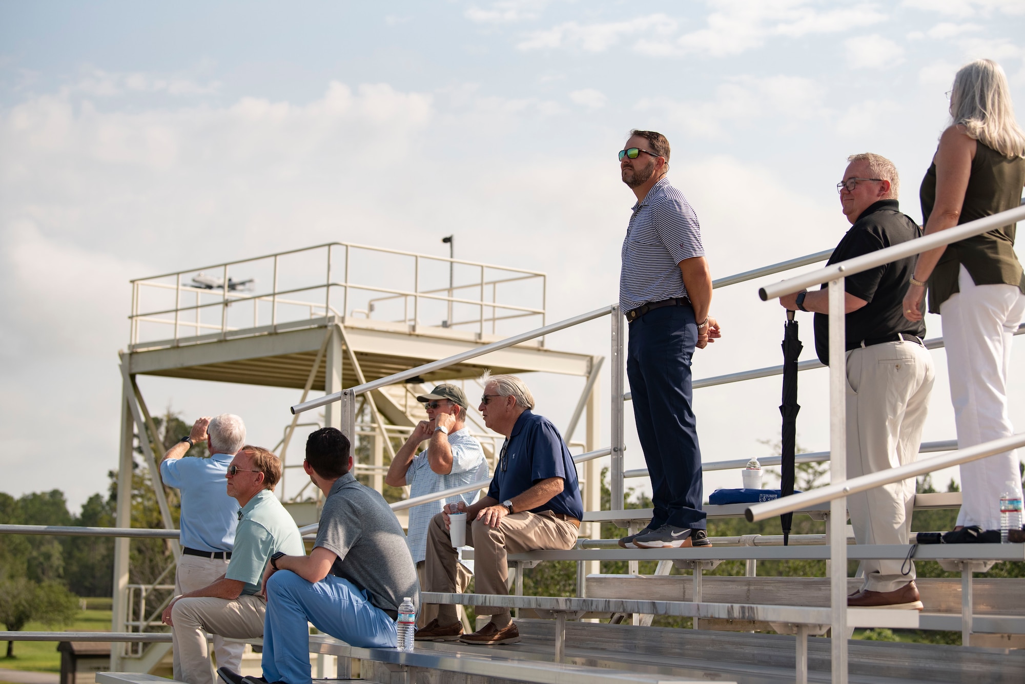 Honorary commanders watch A-10C Thunderbolt II aircraft practice close air support sorties during an immersion day at Moody Air Force Base, Georgia, June 21, 2023. During the Honorary Commander Immersion Day, key leaders from the local area learned about the mission of the 23rd Fighter Group, watched A-10C Thunderbolt II aircraft perform close air support sorties, learned about the aircraft from the pilots who fly them, and got hands-on experience with aircrew equipment. (U.S. Air Force photo by Staff Sgt. Thomas Johns)