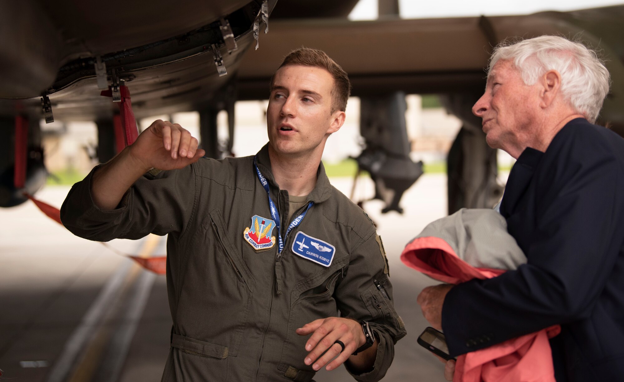 U.S. Air force Capt. Joshua “Darwin” Kisbye, 74th Fighter Squadron A-10C Thunderbolt II pilot, educates honorary commanders about the aircraft during an immersion ay at Moody Air Force Base, Georgia, June 21, 2023. During the HCC immersion day, members of the 23rd Fighter Group, 74th Fighter Squadron and 23rd Operations Support Squadron educated HCCs about various missions and equipment. (U.S. Air Force photo by Staff Sgt. Thomas Johns)