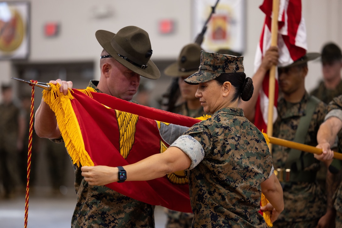 Marines and guests gathered at the All Weather Training Facility for the deactivation ceremony of Fourth Recruit Training Battalion, Recruit Training Regiment, on Marine Corps Recruit Depot Parris Island, S.C., June 15, 2023. The deactivation of the unit will standardize recruit training for men and women and will allow the Marine Corps to reorganize its recruit training personnel structure to facilitating a closer organizational structure alignment between the two recruit training depots. (U.S. Marine Corps photo by Lance Cpl. Michelle Brudnicki)