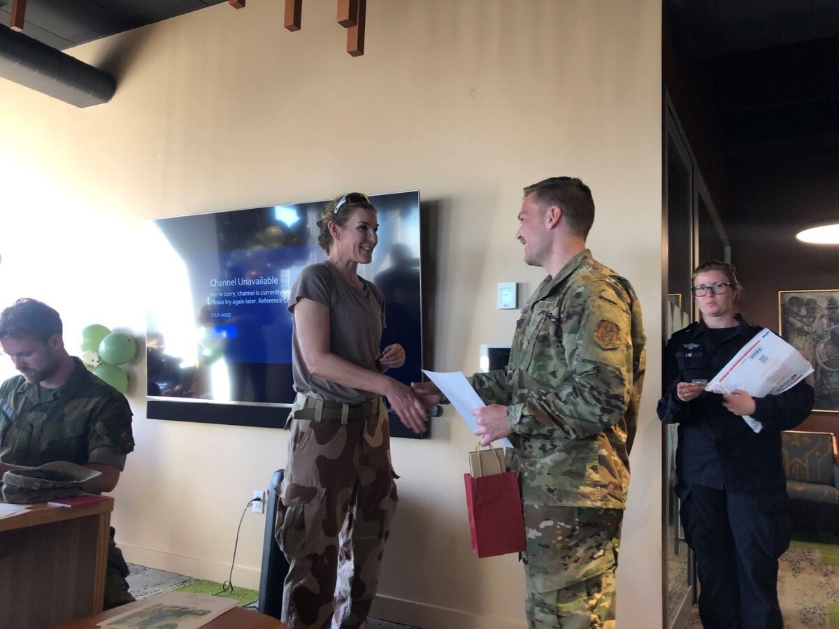 Photo of people shaking hands.