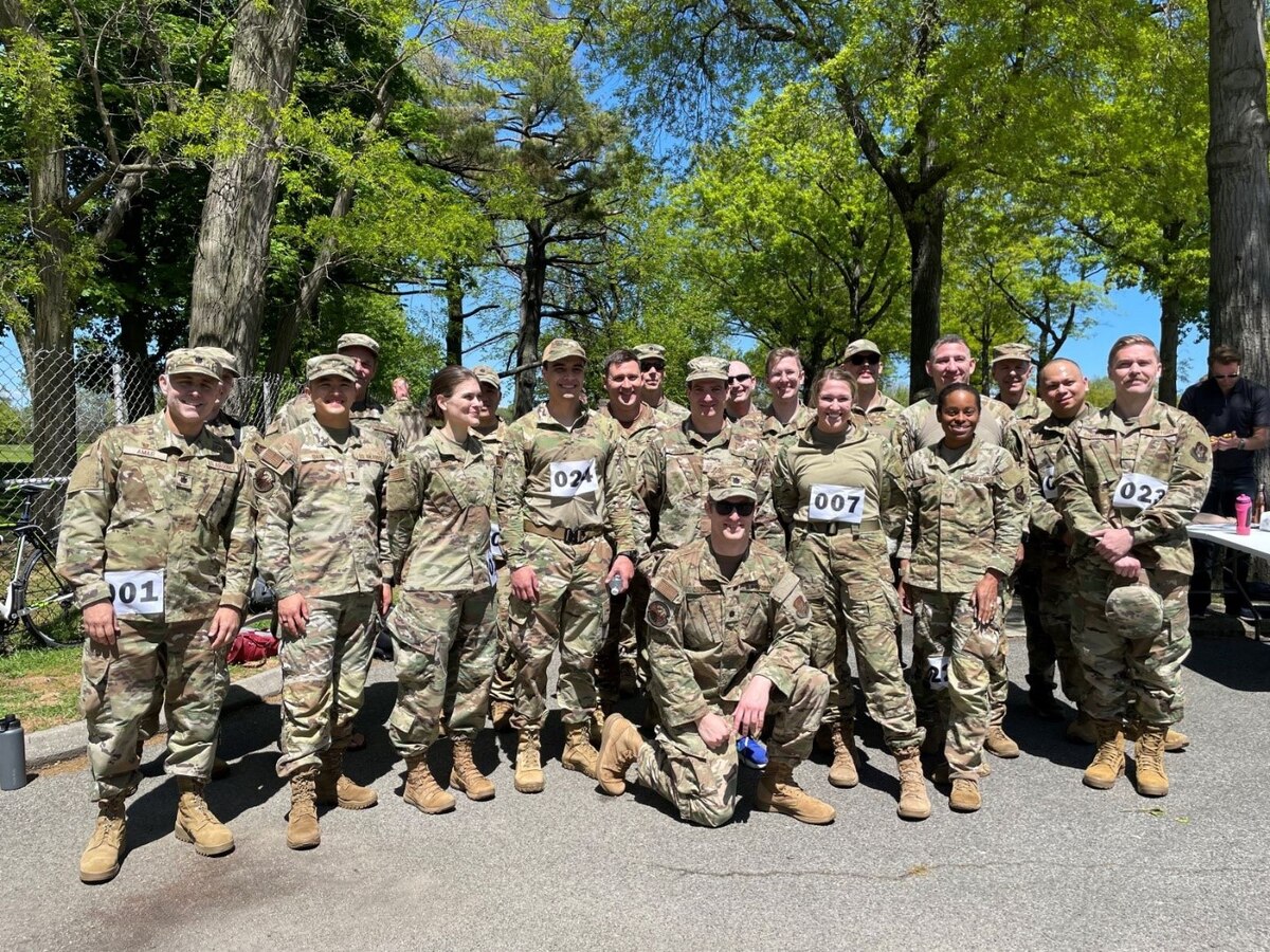 Group of Airmen posing for a photo.