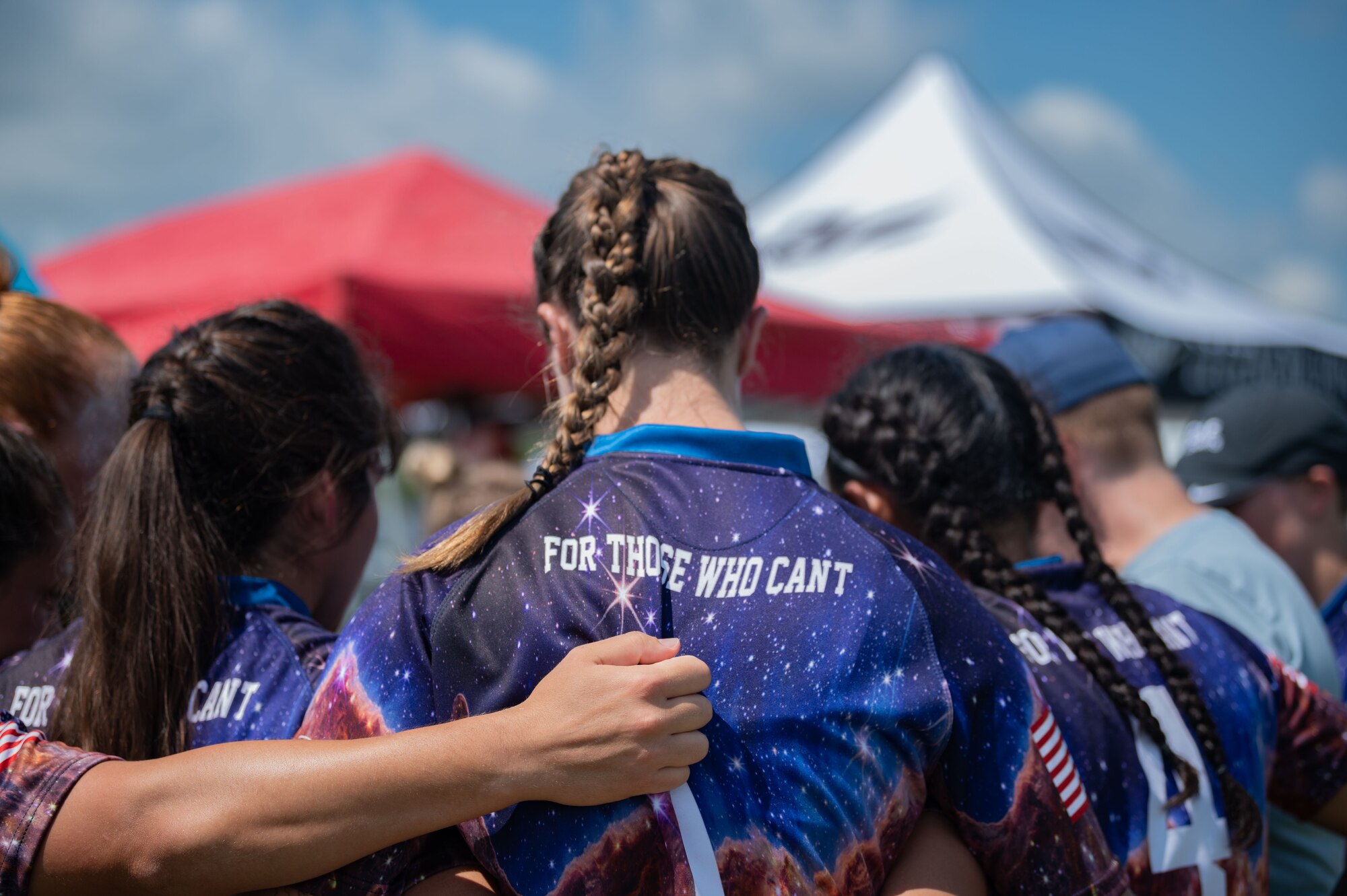 The combined U.S. Air Force and Space Force Women’s Rugby Team meets for a team huddle before a match at the Annual Armed Forces Women’s Rugby Championship in Wilmington, North Carolina, June 24, 2023. The joint competition included athletes from each branch in the Department of Defense to promote fitness and camaraderie. (U.S. Air Force photo by Airman 1st Class Rebecca Sirimarco-Lang)