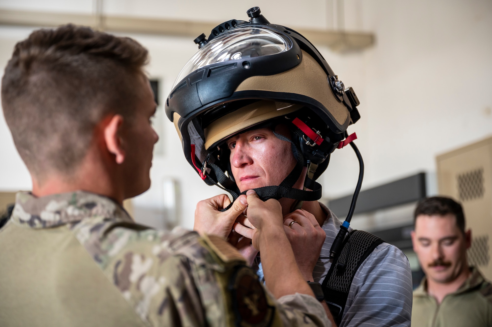 Person putting on military gear