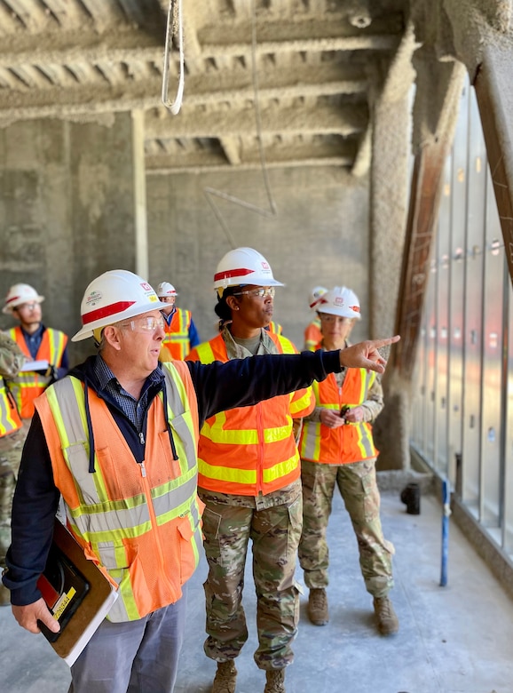 Michael Martino, quality assurance lead with the U.S. Army Corps of Engineers Los Angeles District, foreground left, shows portions of the under-construction Spinal Cord Injury/Community Living Center to Brig. Gen. Antoinette Gant, the Corps’ South Pacific Division commander, center, June 28 at the Veterans Affairs San Diego Health Care System campus. Accompanying Gant is Col. Julie Balten, Los Angeles District commander, right.
