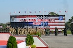 Soldiers with the U.S. Army and the Royal Thai Army stand in formation during the opening ceremony for Hanuman Guardian 2022 at the Infantry Center, Khao Noi, Kingdom of Thailand, Feb. 24, 2022. Hanuman Guardian 2022 is the 11th iteration of the annual bilateral U.S. Army Pacific Theater Security Cooperation Program event conducted with the Royal Thai Army in coordination with United States Indo-Pacific Command. As part of the Pacific Pathways series, the goal of HG22 is to foster closer relationships, increase readiness, and enhance interoperability among service members of the U.S. Army and Royal Thai Army. (U.S. Army photo by Danielle O'Donnell)