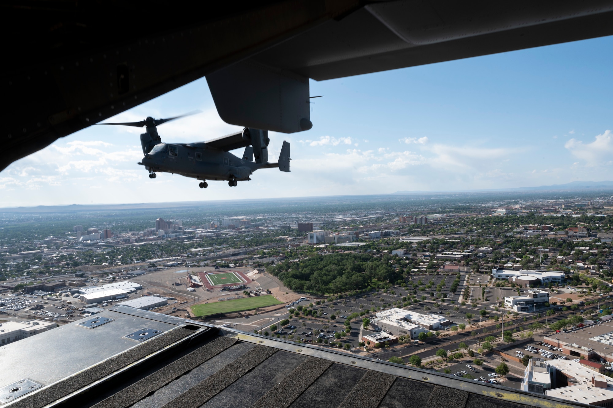 A Cv-22 flies over ABQ.