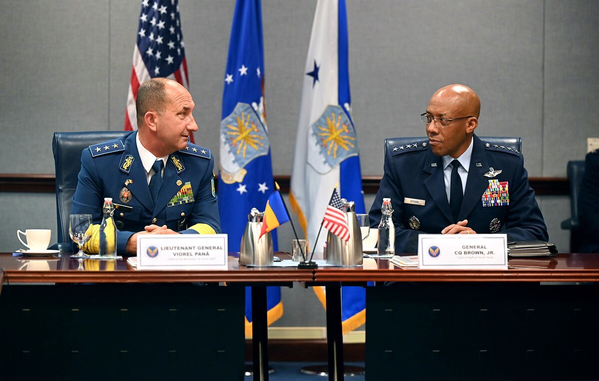 Air Force Chief of Staff Gen. CQ Brown, Jr. hosts a staff discussion with Chief of the Romanian Air Force Staff Lt. Gen. Viorel Pană at the Pentagon, Arlington, Va., June 27, 2023.