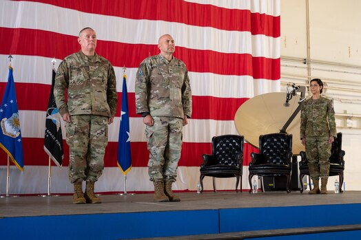  From the left, U.S. Air Force Maj. Gen. Patrick Cobb, Air National Guard Assistant to the Commander, U.S. Space Operations Command, U.S. Space Force Col. Christopher Fernengel, outgoing Delta 3-Space Electromagnetic Warfare commander, and Col. Nicole Petrucci, incoming DEL 3 commander, stand at attention to orders June 29, 2023, at Peterson Space Force Base. (U.S. Space Force photo by Airman 1st Class Cody Friend)