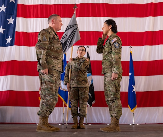  U.S. Air Force Maj. Gen. Patrick Cobb, Air National Guard Assistant to the Commander, U.S. Space Operations Command, (left) stands at attention while U.S. Space Force Col. Nicole Petrucci, incoming Space Delta 3 commander, salutes and takes command of DEL 3 June 29, 2023, at Peterson Space Force Base. DEL 3 trains and presents operational combat-ready space electromagnetic warfare forces in support of assigned missions. (U.S. Space Force photo by Airman 1st Class Cody Friend)