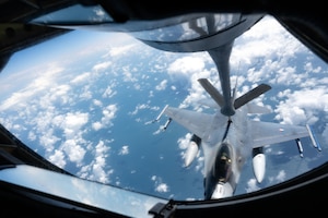 An aircraft is refueled in the air.