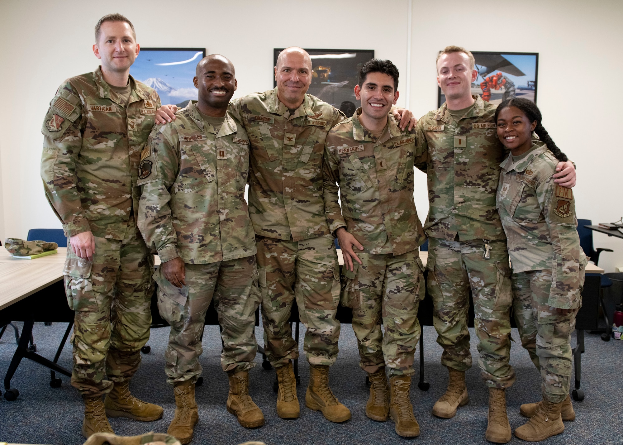 six soldiers line and pose for a picture