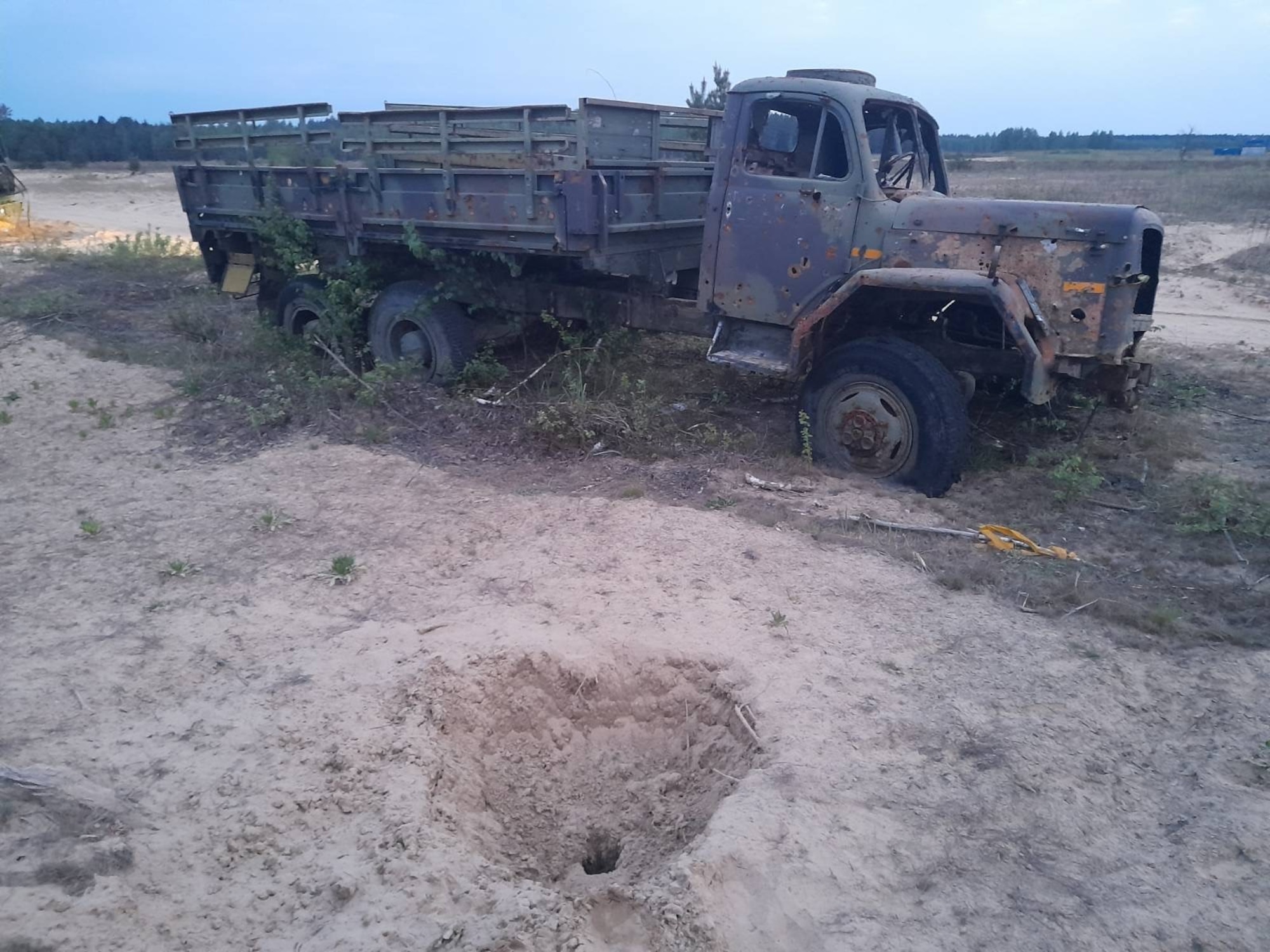 A crater is left after the first-ever Global Positioning System/Inertial Navigation System-guided munition struck its target at an air-to-ground training range in Kazlu Ruda, Lithuania, May 15, 2023.