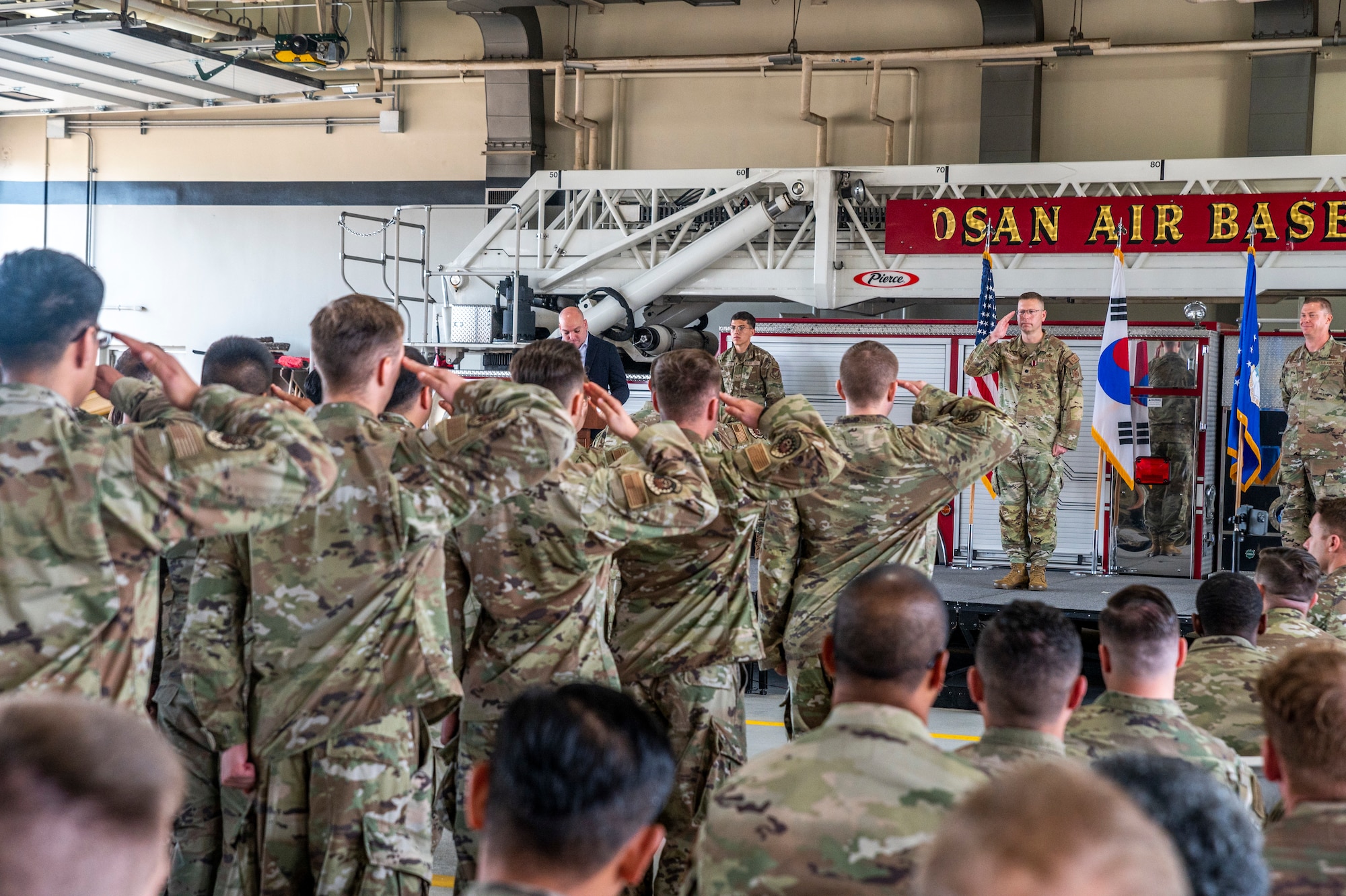 U.S. Air Force Lt. Col. Brian Low, 51st Civil Engineer Squadron (51st CES) outgoing commander, renders a final salute to his squadron at a change of command ceremony at Osan Air Base, Republic of Korea, July 5, 2023.