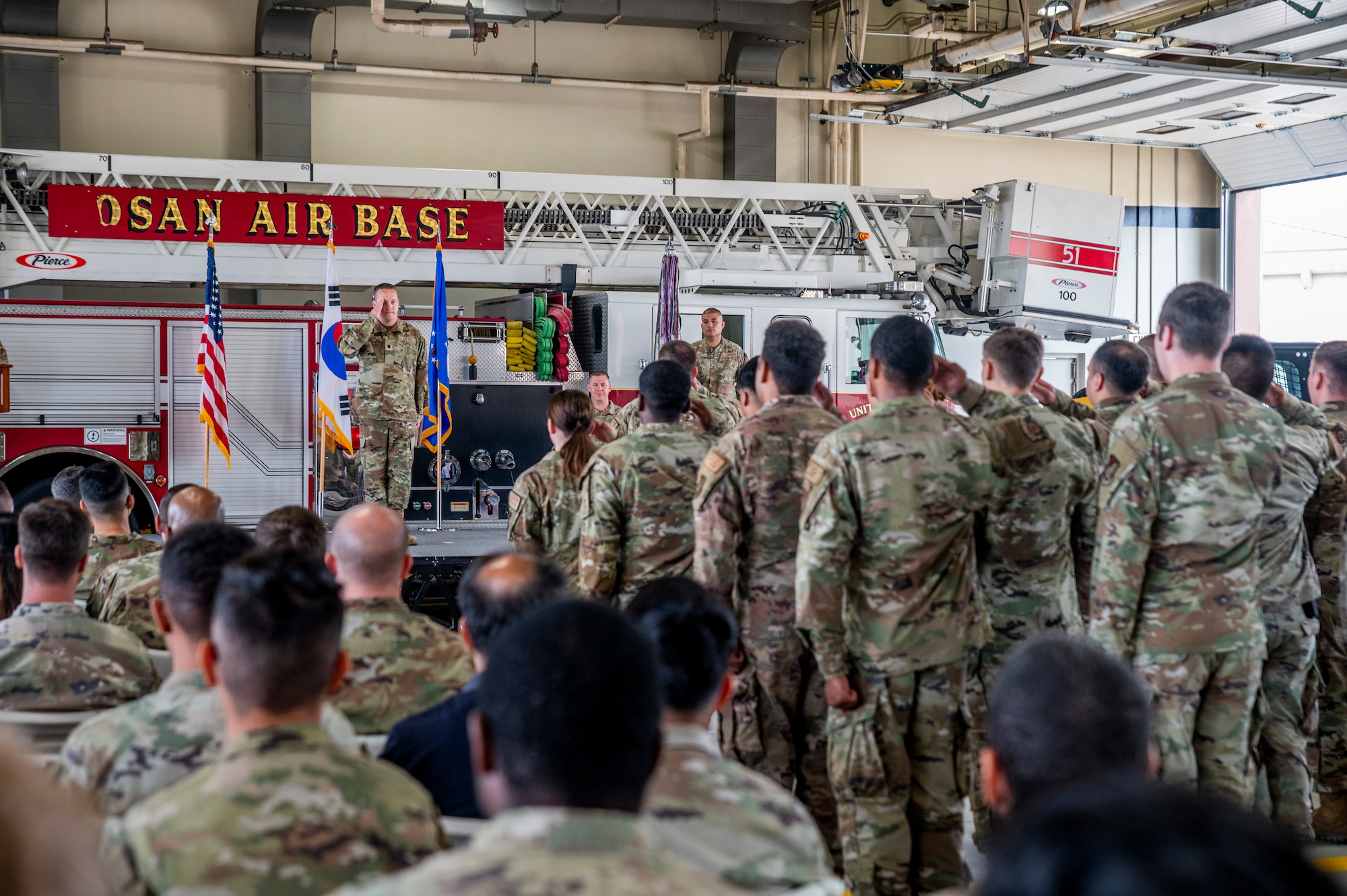 U.S. Air Force Lt. Col. Andrew Myers, 51st Civil Engineer Squadron (51st CES) incoming commander, renders an initial salute to his squadron during a change of command ceremony at Osan Air Base, Republic of Korea, July 5, 2023.