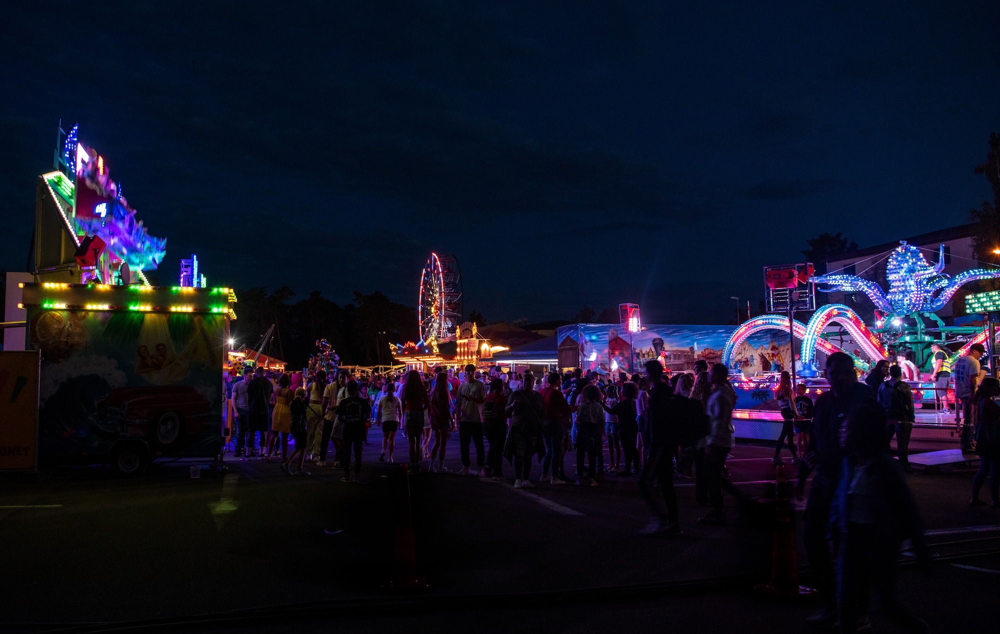 Members of the Kaiserslautern Military Community ride carnival rides during Freedom Fest at Ramstein Air Base, Germany, July 4, 2023.