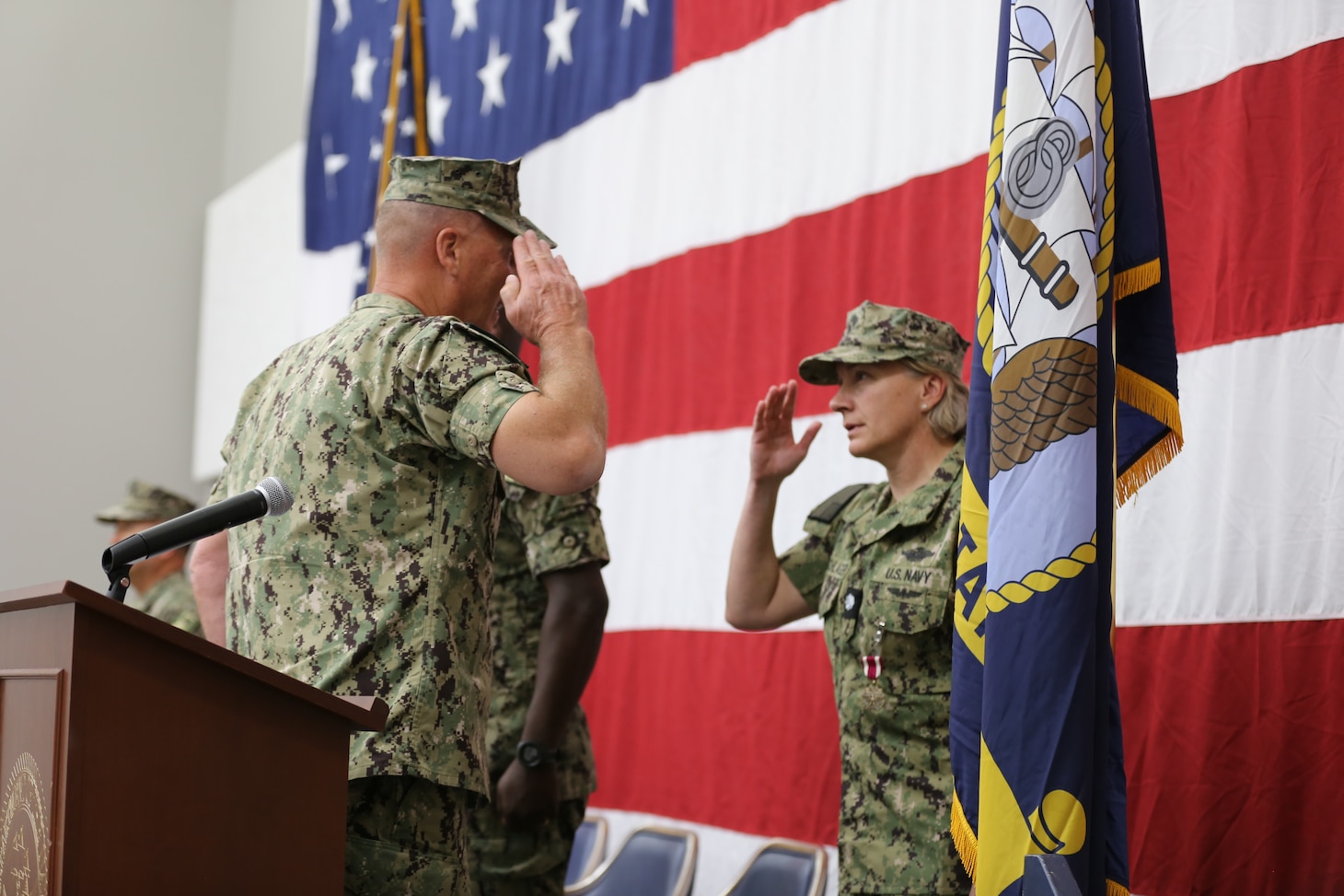 Cmdr. Kimberly Oelschlager relieved by Cmdr. Thomas Murphy during the change of charge ceremony for Navy Medicine and Training Unit Fallon located aboard Naval Air Station Fallon.