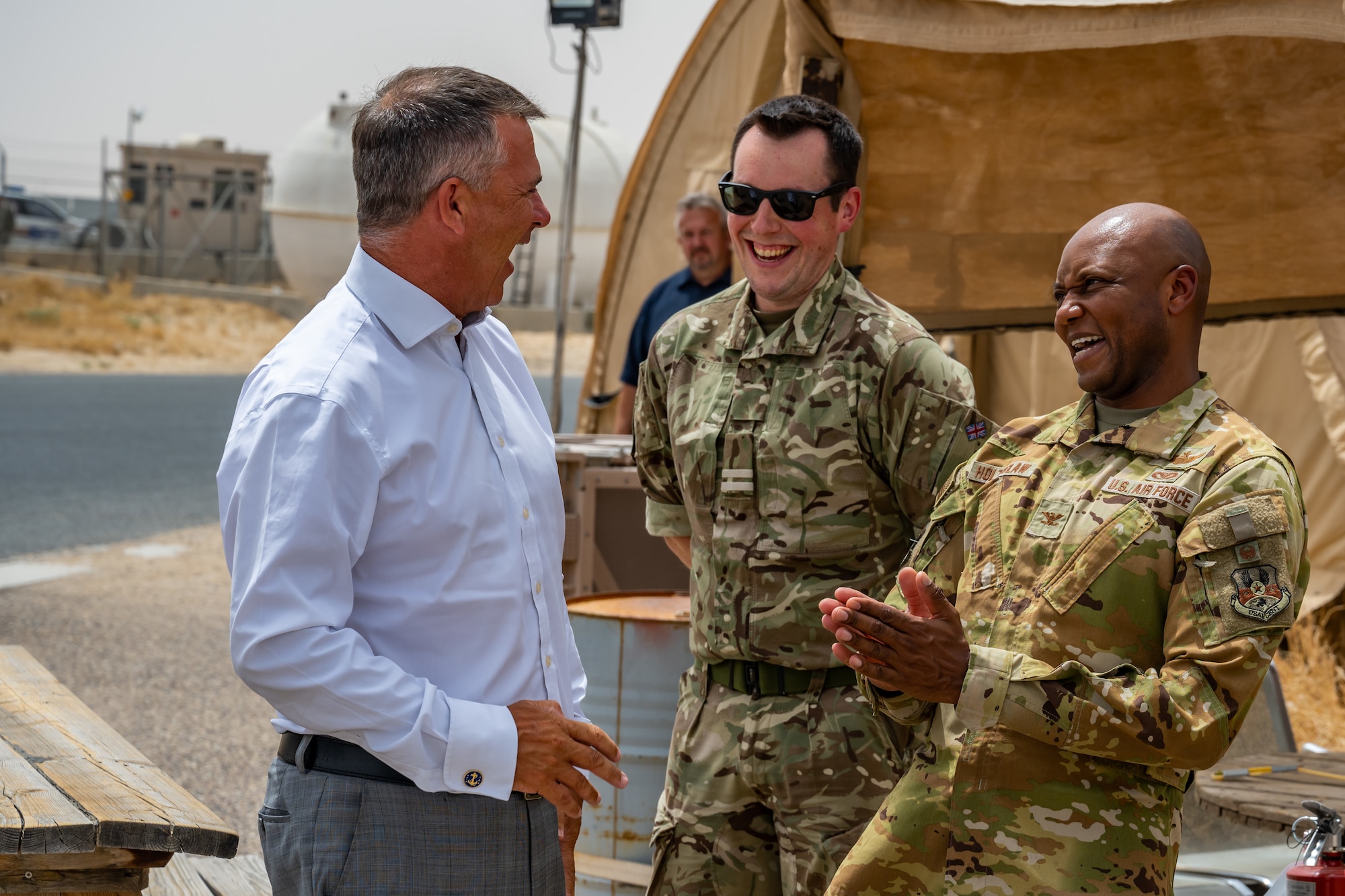 From left, Lord Mark Lancaster, United Kingdom Government’s Defence Export Advocate, Royal Air Force Flight Lieutenant Nicholas Lloyd, and U.S. Air Force Col. Damion Holtzclaw, 386th Air Expeditionary Wing deputy commander, meet during a tour of the installation at Ali Al Salem Air Base, Kuwait, July 4, 2023. A group of U.K. leaders traveled to Kuwait to foster the working relationship between the U.K. and their Kuwaiti partners, and the visit also provided the opportunity for the U.S. to further the connection with our coalition partners on a strategic level. (U.S. Air Force photo by Staff Sgt. Kevin Long)