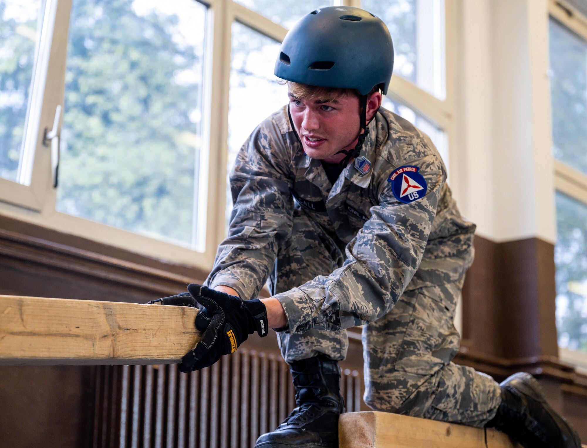 person holds a plank