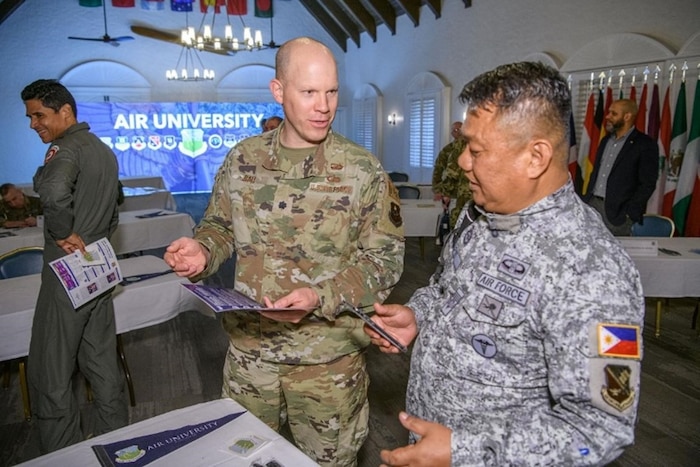 Lt Col Michael Ball, Chief, International Affairs Policy and Programs Division, Air University International Affairs, chatted with a Philippine Chief Master Sergeant about enlisted PME opportunities at Air University during Air University’s inaugural International Alumni of Distinction Seminar in March 2023.
