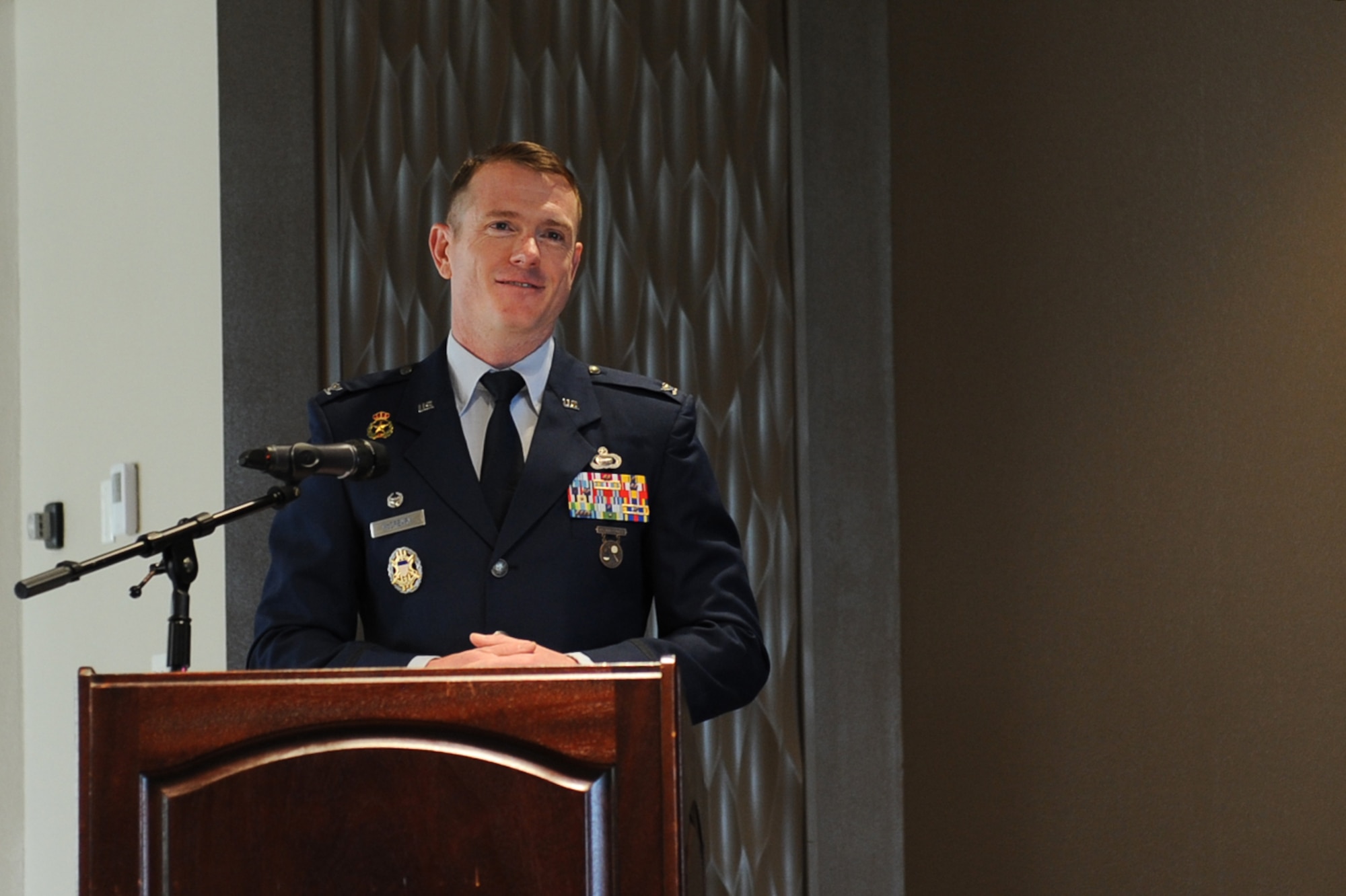 Col. Brian McCreary, Global Exploitation Intelligence Group commander, addresses GX Airmen for the first time following a change of command ceremony at Wright-Patterson Air Force Base, Ohio, June 30, 2023. A change of command ceremony underscores the continuity of leadership and unit identity despite changes in individual authority, providing the unit’s members a sense of organizational stability and progress. (U.S. Air Force photo by Senior Airman Kendall Stuckman)