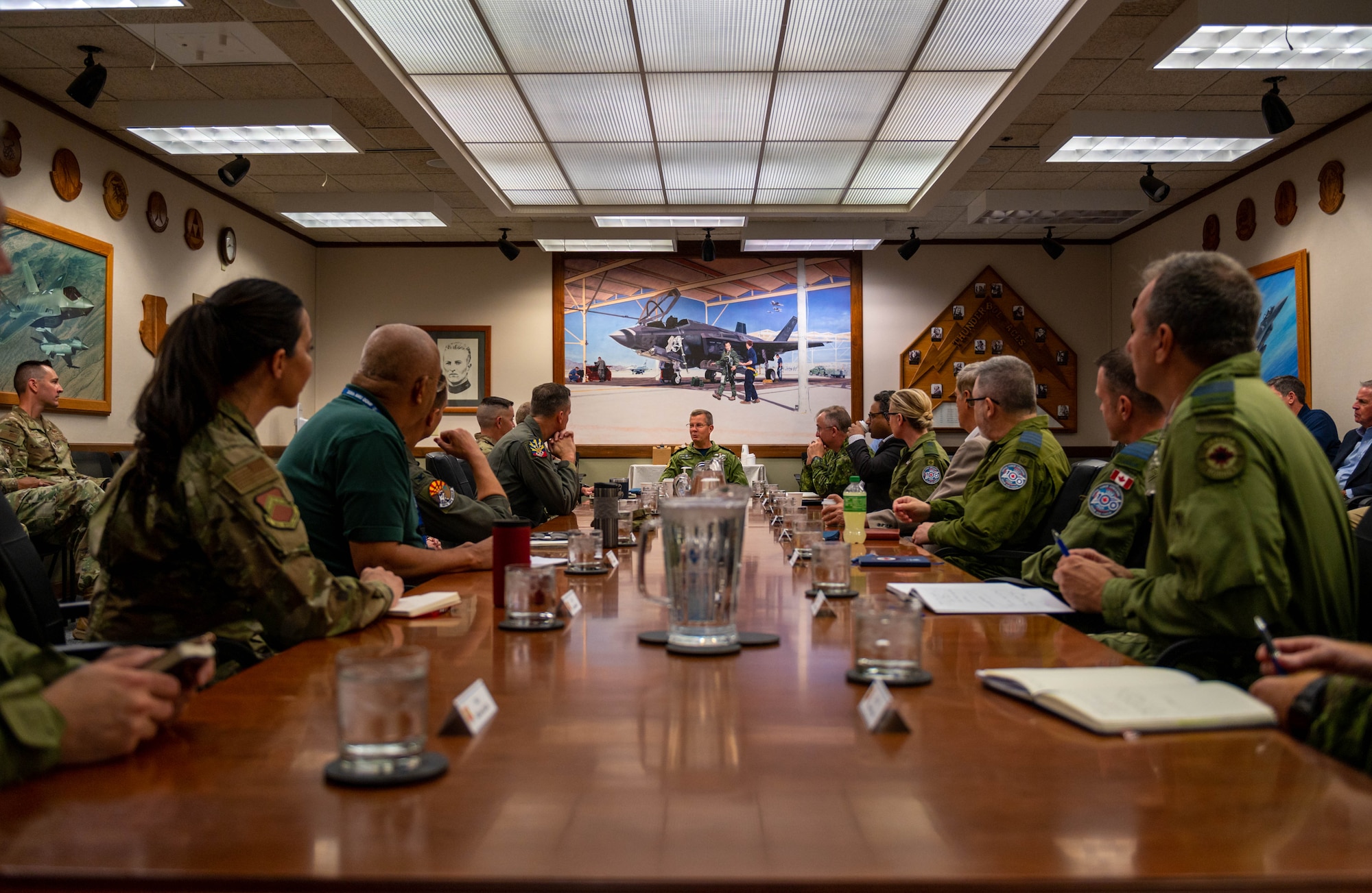 Royal Canadian Air Force Lt. Gen. Eric Kenny, RCAF commander, discusses future operations with Luke Air Force Base leadership.