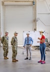 Capt. JD Crinklaw, middle left, commander, Puget Sound Naval Shipyard & Intermediate Maintenance Facility, tours the San Diego Detachment June 27, 2023, with (from left) Cmdr. Brandon Johnson, executive officer, PSNS & IMF; Jeremy Miller, director, San Diego Detachment; and Tanya Lalicker, Detachment site manager. (U.S. Navy photo by Wendy Hallmark)