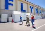 Capt. JD Crinklaw, commander, Puget Sound Naval Shipyard & Intermediate Maintenance Facility, tours the PSND & IMF Detachment San Diego, June 27, 2023, with Jeremy Miller, director, San Diego Detachment, Cmdr. Brandon Johnson, executive officer, PSNS & IMF, and Tanya Lalicker, Detachment site manager. (U.S. Navy photo by Wendy Hallmark)