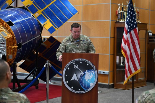  Man speaks at podium