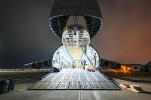 A C-5M Super Galaxy assigned Westover Air Reserve Base, Mass., arrives and unloads cargo