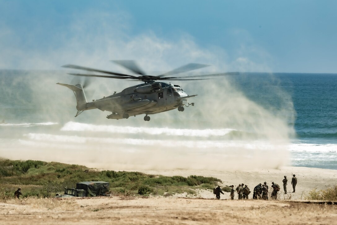 U.S. Marines with 1st Battalion, 1st Marine Regiment, 1st Marine Division, simulate medical evacuations during an amphibious raid course hosted by Expeditionary Operations Training Group, I Marine Expeditionary Force, at Marine Corps Base Camp Pendleton, California, June 21, 2023. The purpose of the amphibious raid course is to train raid force tactics, techniques, and procedures to enhance 1st Bn., 1st Marines’ capabilities in preparation for their deployment with the 31st Marine Expeditionary Unit. (U.S. Marine Corps photo by Cpl. Garcia)
