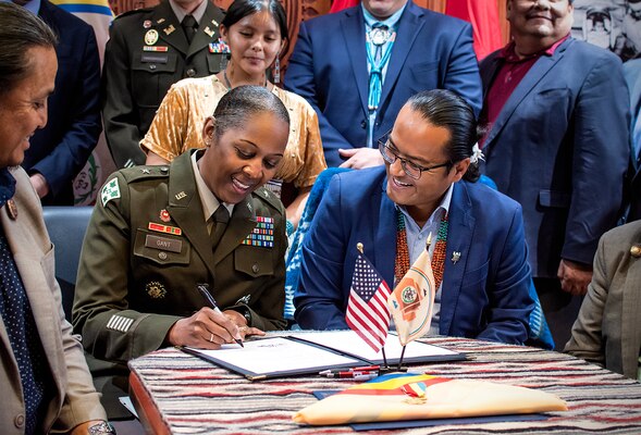 U.S. Army Brig. Gen. Antoinette Gant (left), commanding general, USACE-South Pacific Division, and Navajo Nation President Buu Nygren sign an agreement intended to improve USACE’s support to Navajo Nation at Window Rock, Arizona, July 6. (U.S. Army photo by Justin Graff, USACE-Albuquerque District Public Affairs)